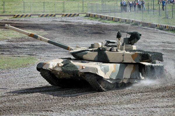 A Russian tank in a camouflage cape