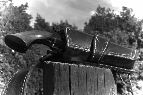 An old revolver in a holster