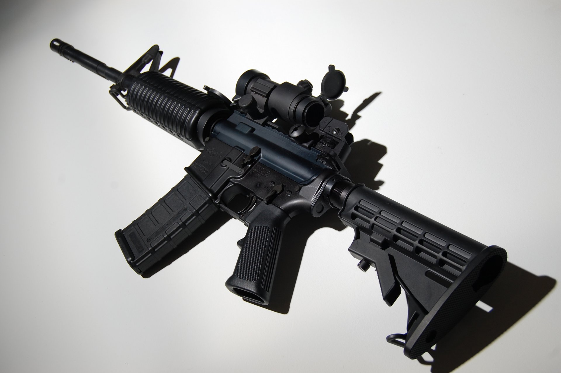 ar-15 assault rifle machine weapon background