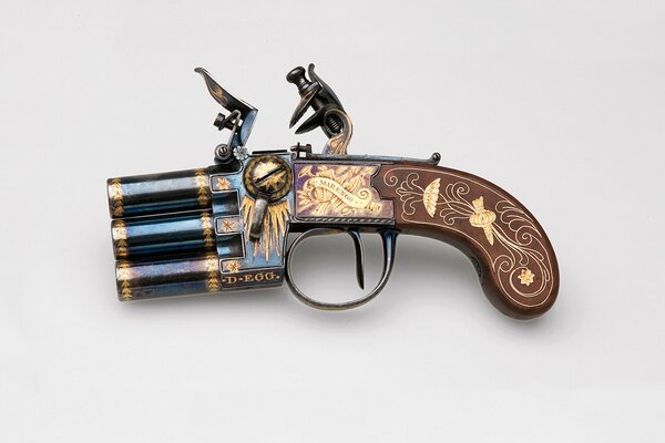 A beautiful antique pistol. Retro