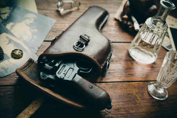 Pistol Mauser in a holster on the table