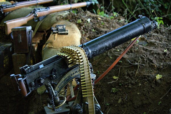 Weapons with cartridge belt in the trench