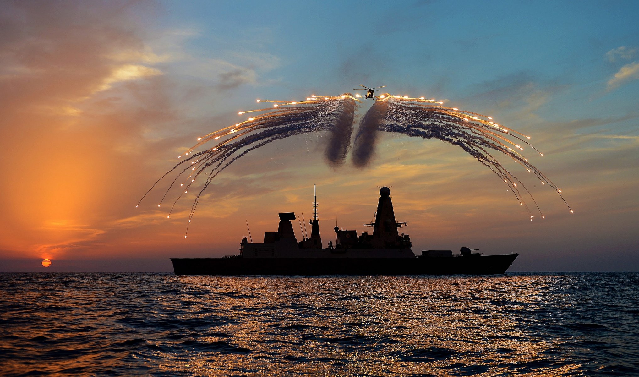 westland lynx helicopters ship sunset silhouette shooting trap heat