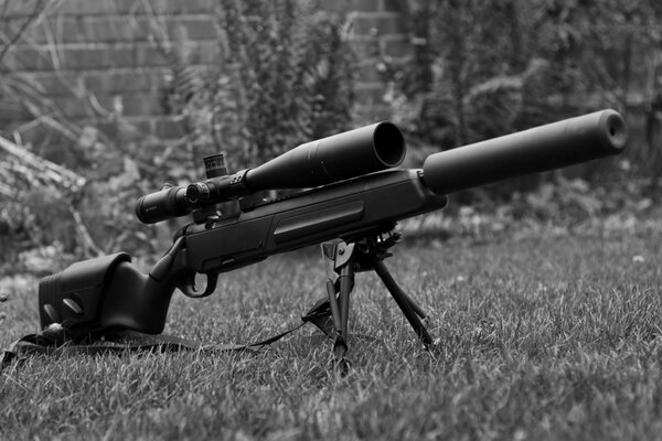 Sniper rifle with silencer side view