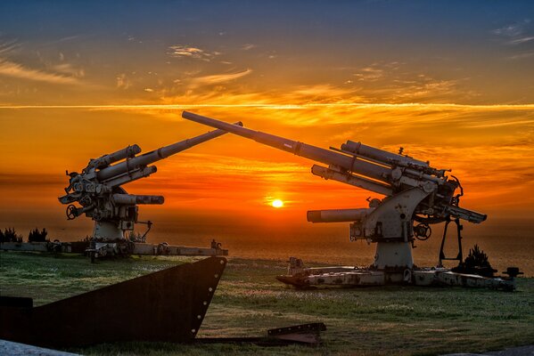 Two anti-aircraft missile guns are aimed at each other