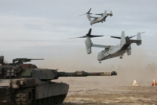 Foto de un tanque de combate en el fondo de convertiplanos