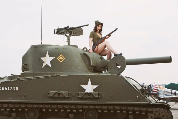 Sexy girl on a tank Sherman .