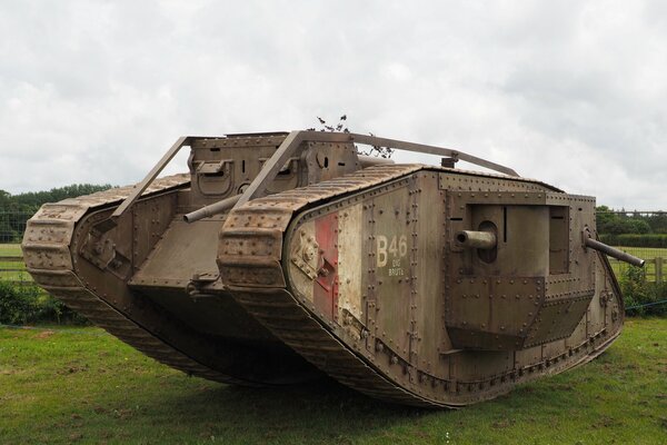 An exhibit of armored vehicles tank on the grass