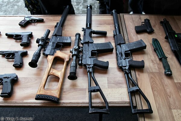 Variety of firearms on the table