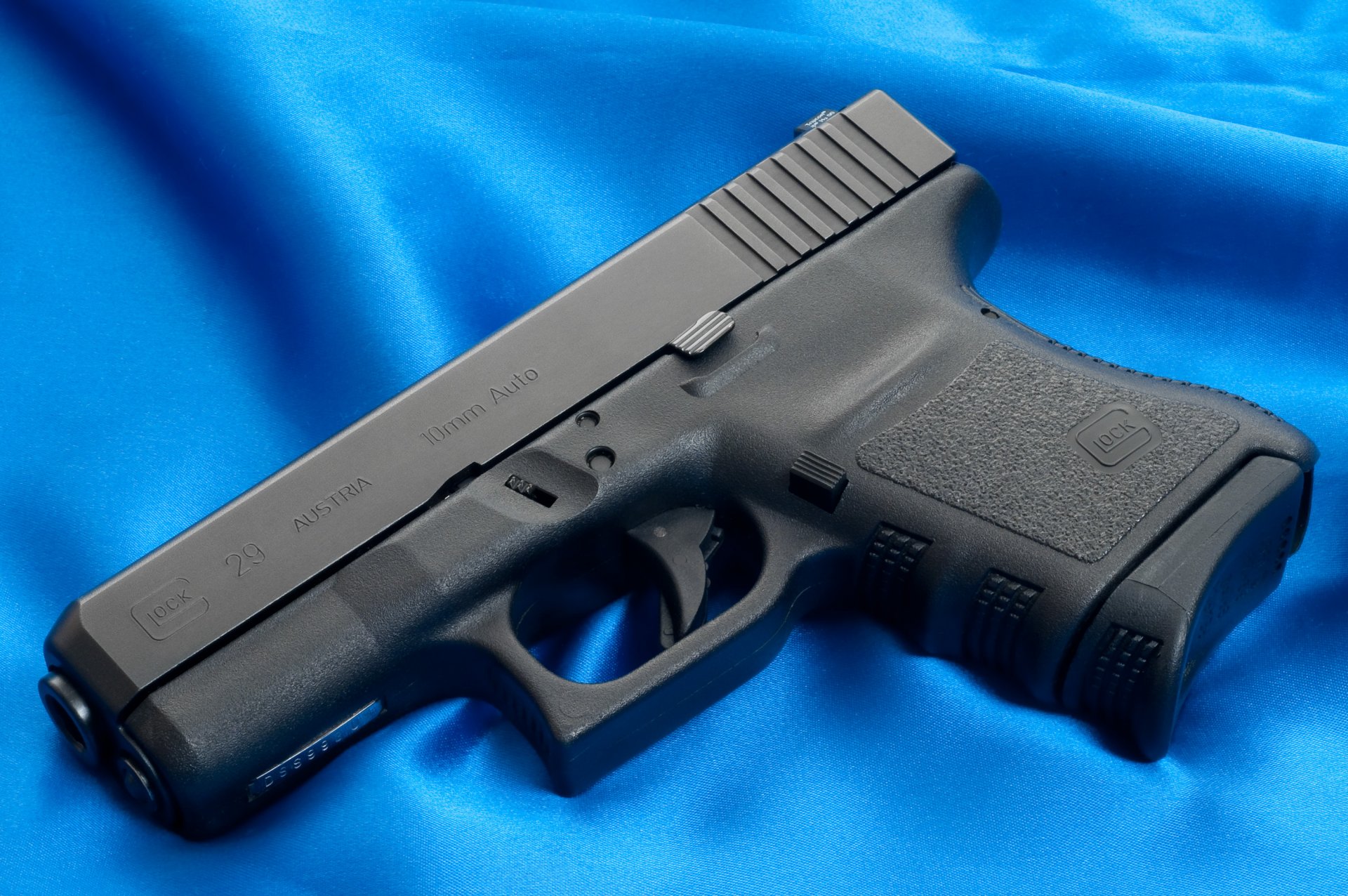 glock pistola arma fondo de pantalla cañón austria lienzo azul fondo