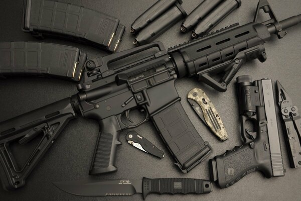 AR-15 assault rifle with clips, knife and pistol