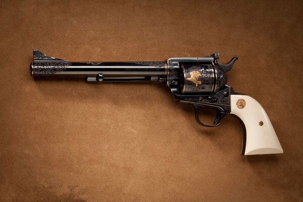 A pistol with a white handle on a brown background