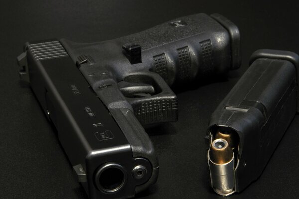 A macro shot of the weapon. Gun and bullet