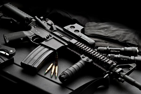 Black machine gun on a black background