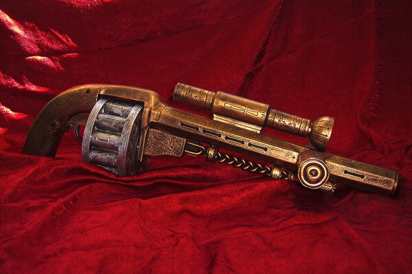 Antique revolver on scarlet velvet