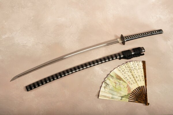 Japanese theme. Katana and fan