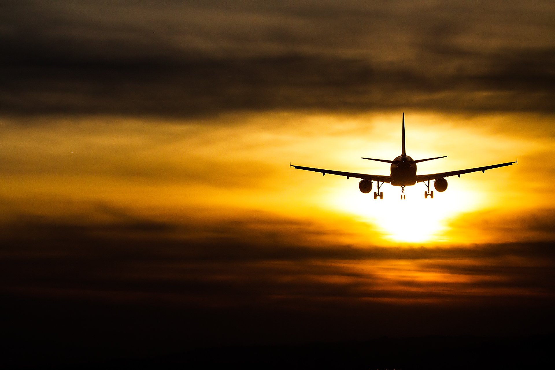 passenger plane sky sunset