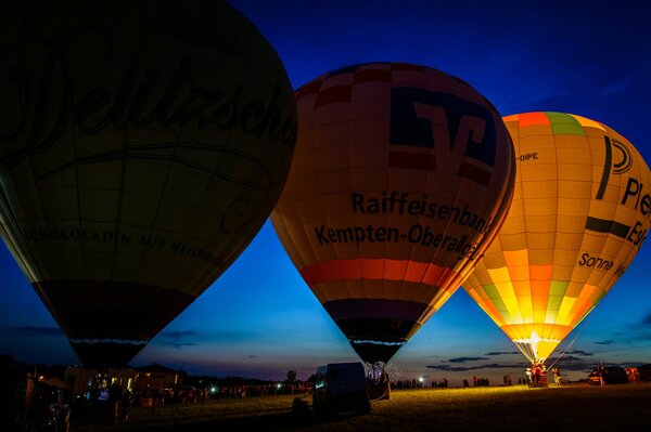 Launching balloons at night. Ignition