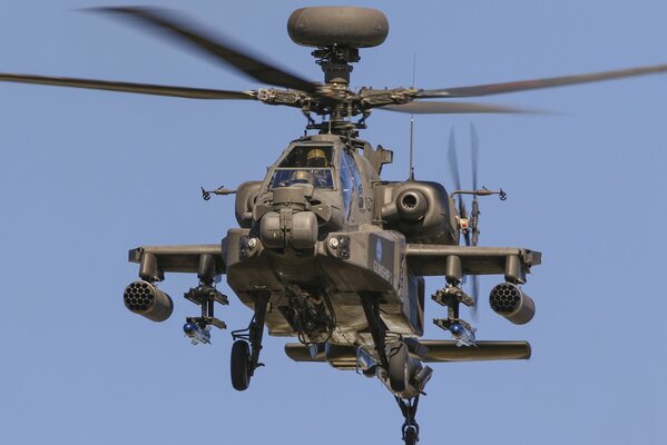 Apache helicopter performs a combat mission