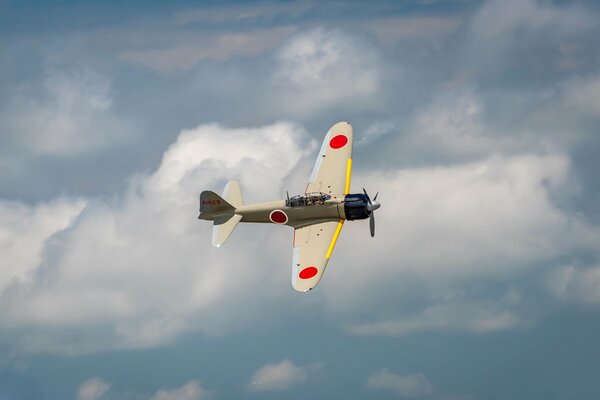 Retro fighter in the blue sky