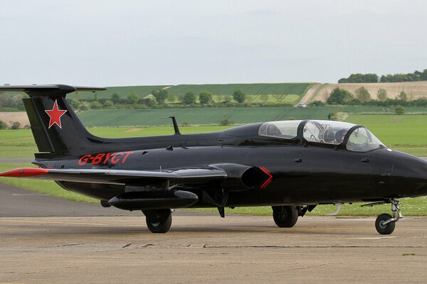 A black Russian plane on the runway