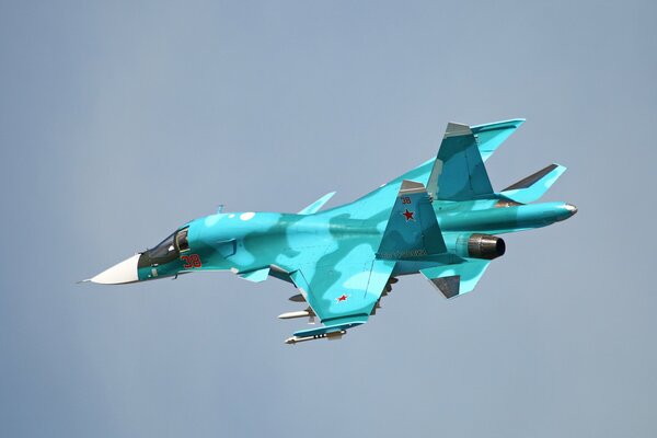 Fighter-bomber performs a U-turn during flight