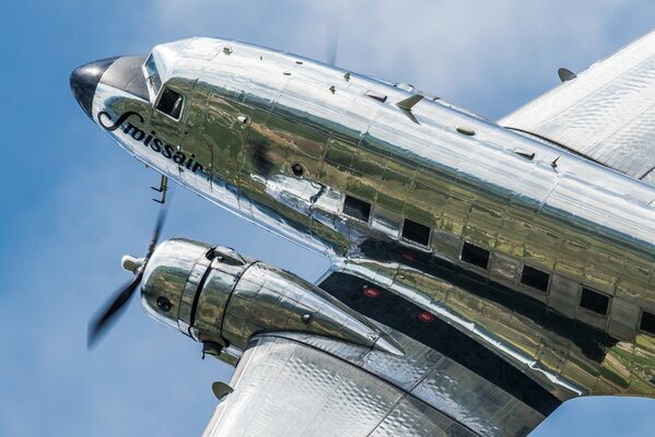 Douglas dc - 3 passenger plane in flight