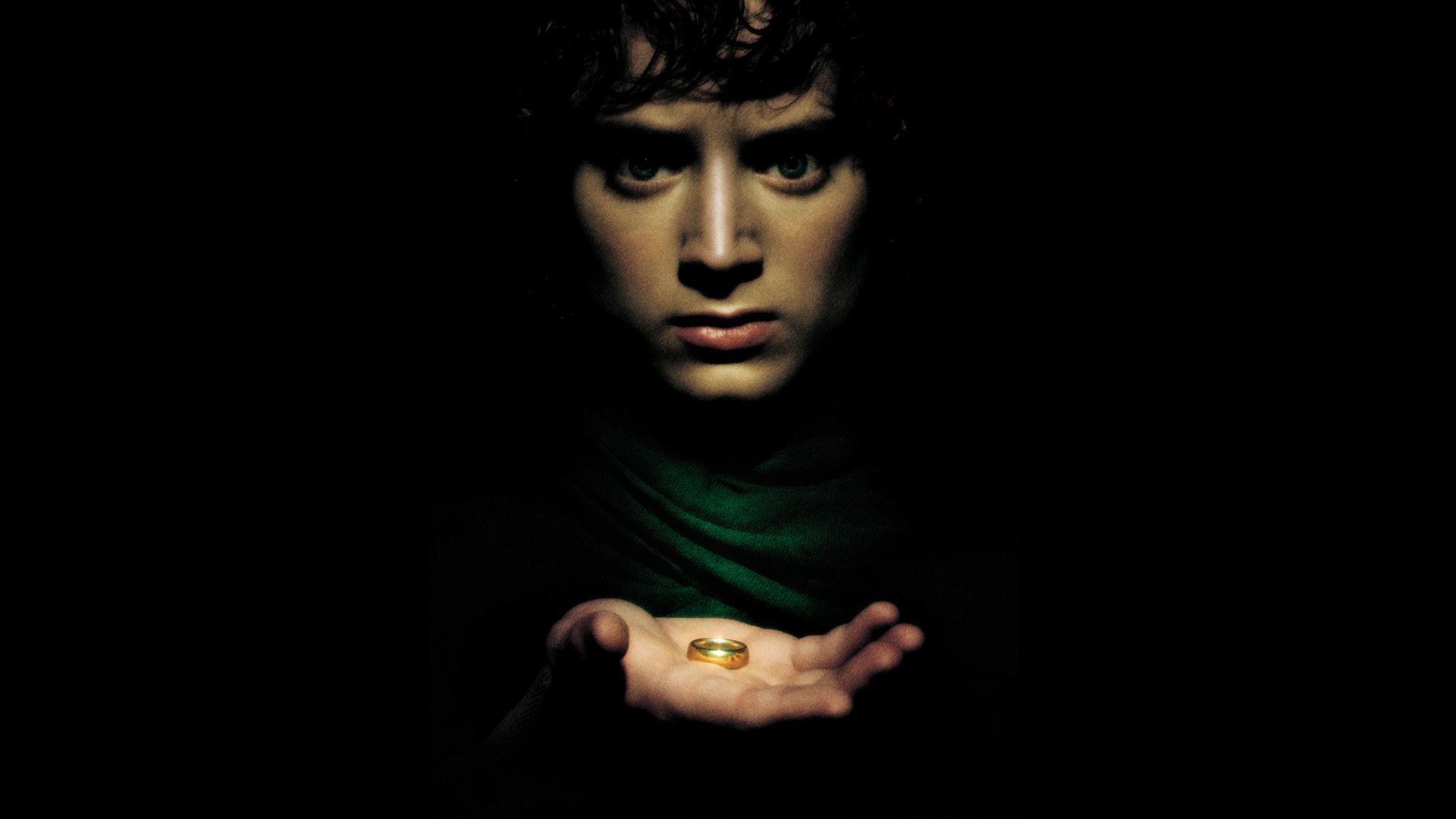 elijah wood frodo lord rings the lord of the rings hobbies fantasy tolkien john ring actor black background scared view hand