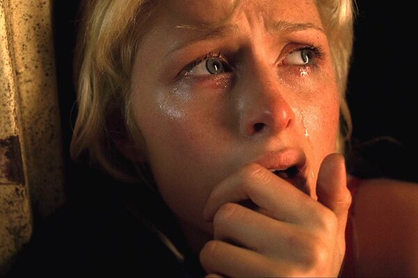 Image of a crying frightened woman