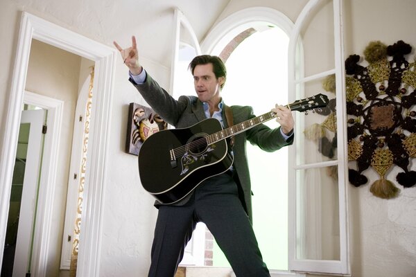 Jim Carrey mit Gitarre Film Sag immer Ja