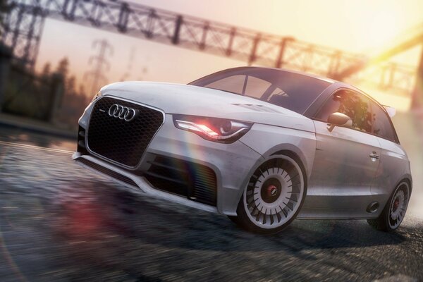 White Audi car driving fast