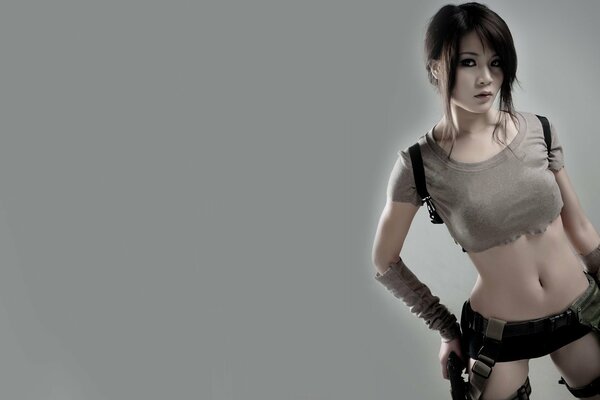 The girl cosplays the character of Lara Croft