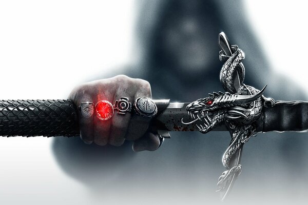 Dragon age 3 hand with 4 rings and a sword in his hand