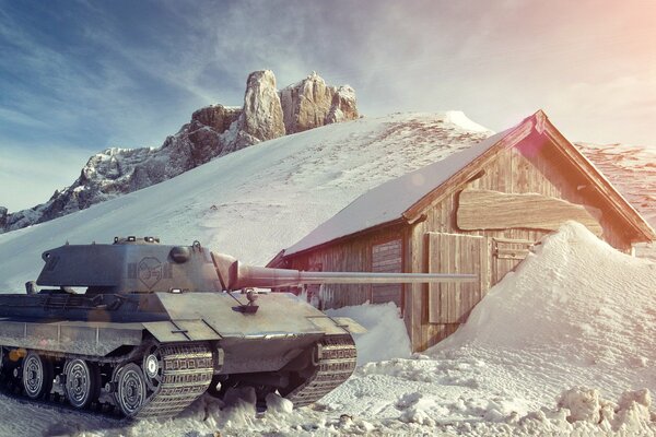 Tanque cerca de la cabaña en las montañas cubiertas de nieve