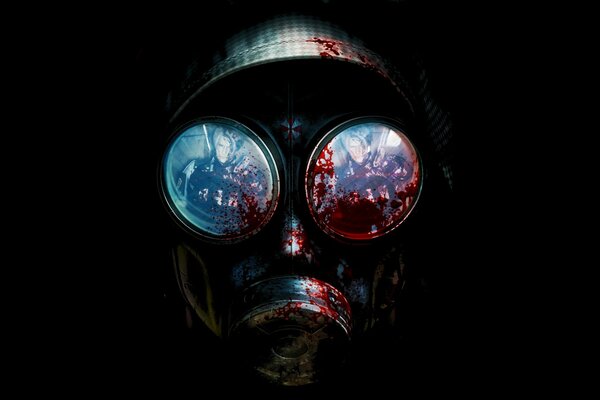 A man in a gas mask stained with blood on a black background