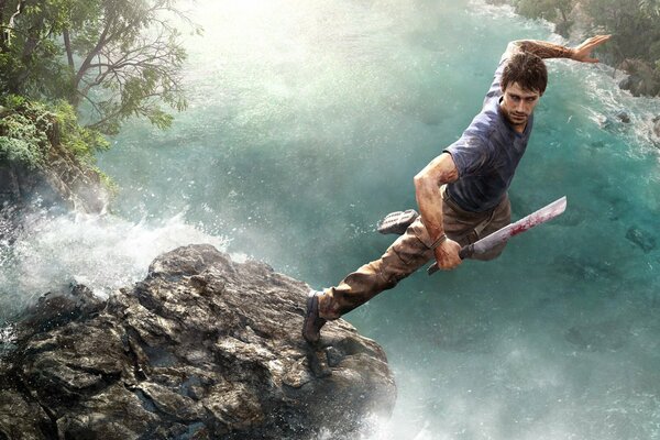Mann springt mit Wasserfall ins Wasser