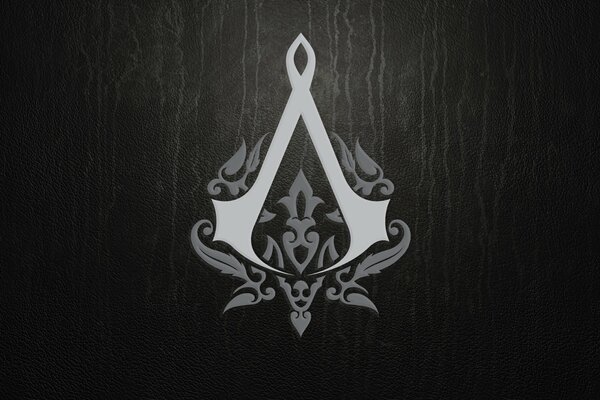 Logo del juego Assassins Creed sobre fondo negro