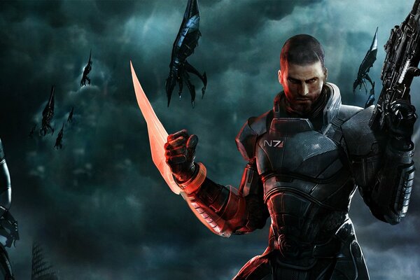 Commander Shepard mit einem Gewehr in der Hand