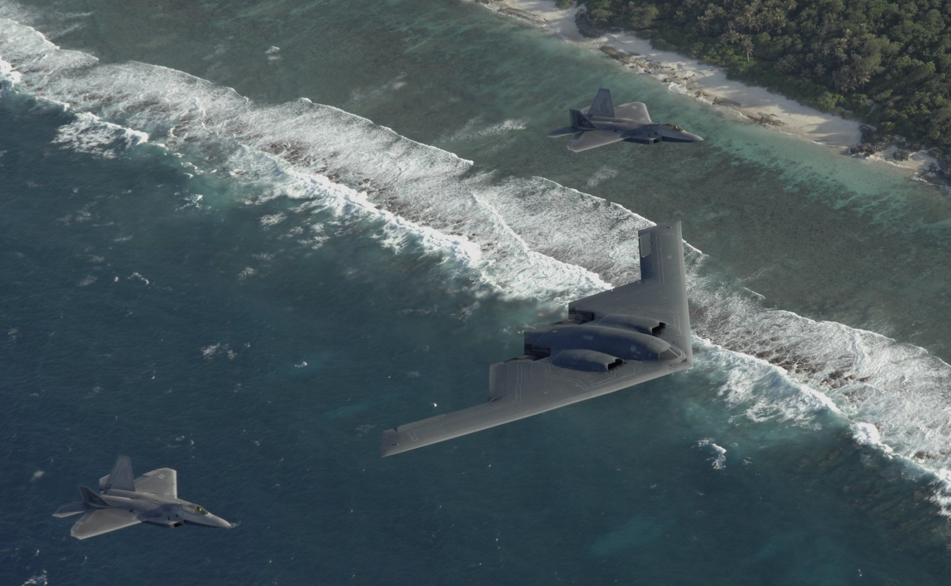 f-22 raptor fighters b-2 spirit bomber flight beach