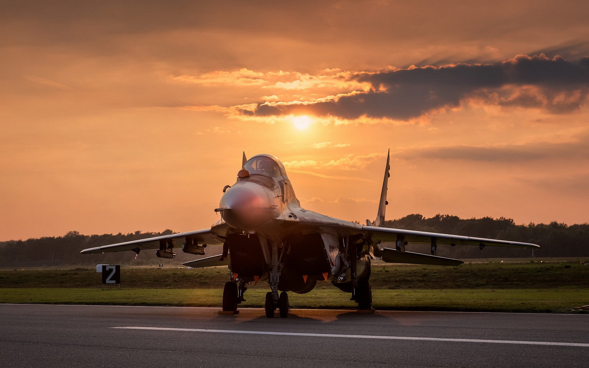 mig-29 aereo armi tramonto