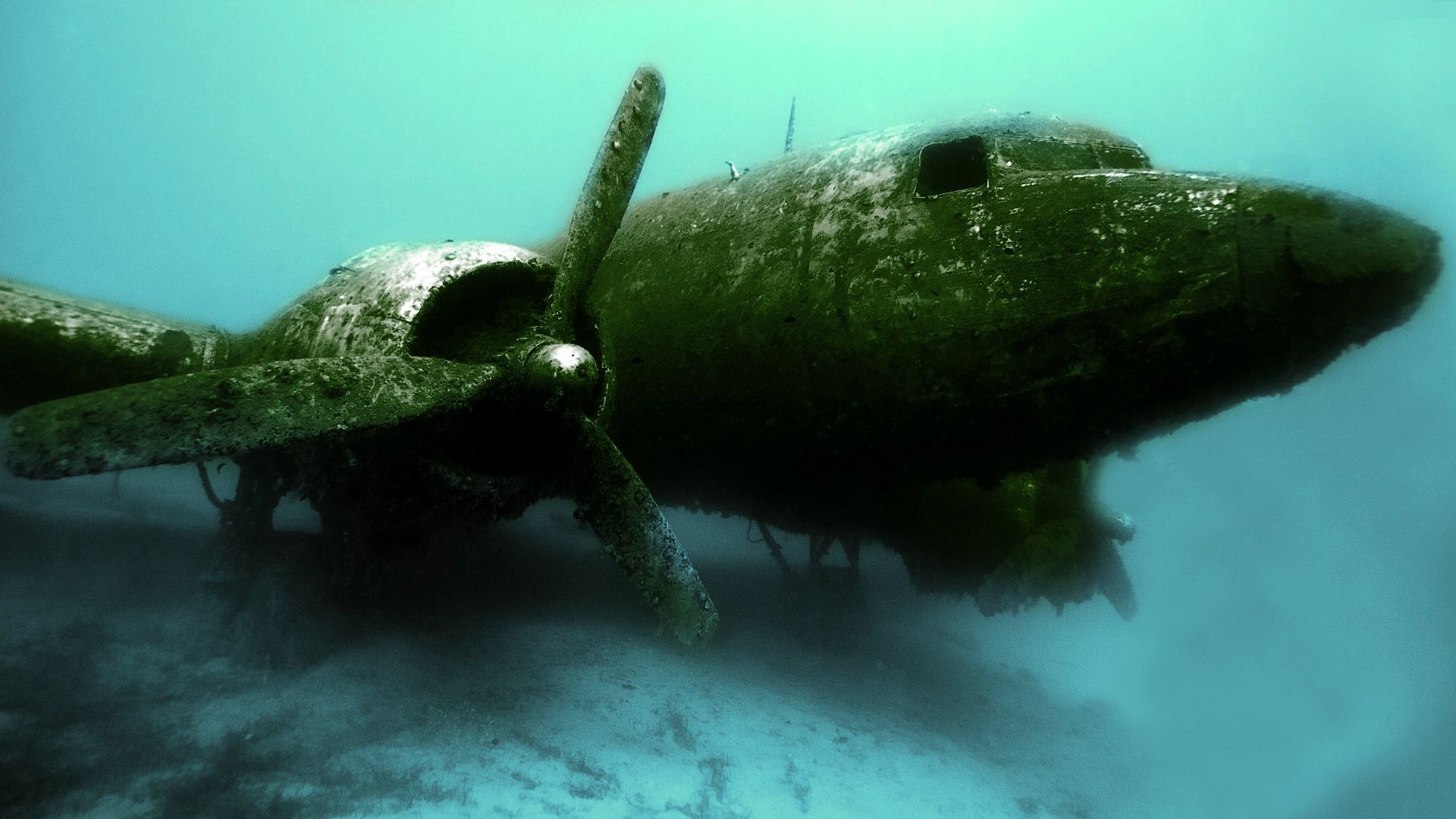 plane aviation downfall fragments under water