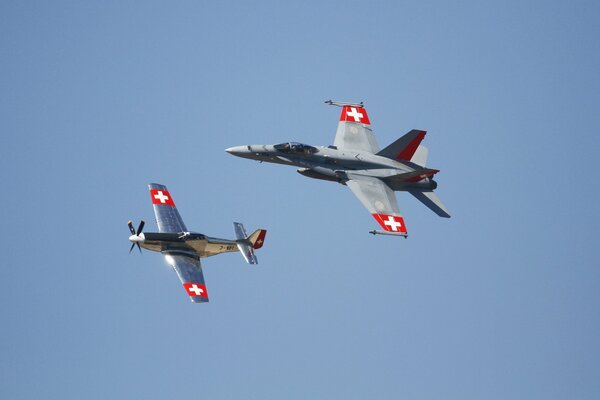 Flying a fighter with a flag in the sky