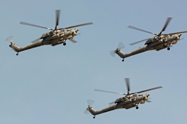 Mi 28 attack helicopters flying over the ground