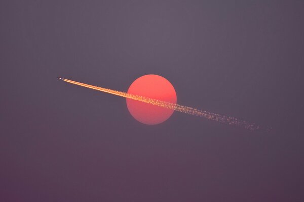 Laisser une trace de samoled sur fond de ciel coucher de soleil