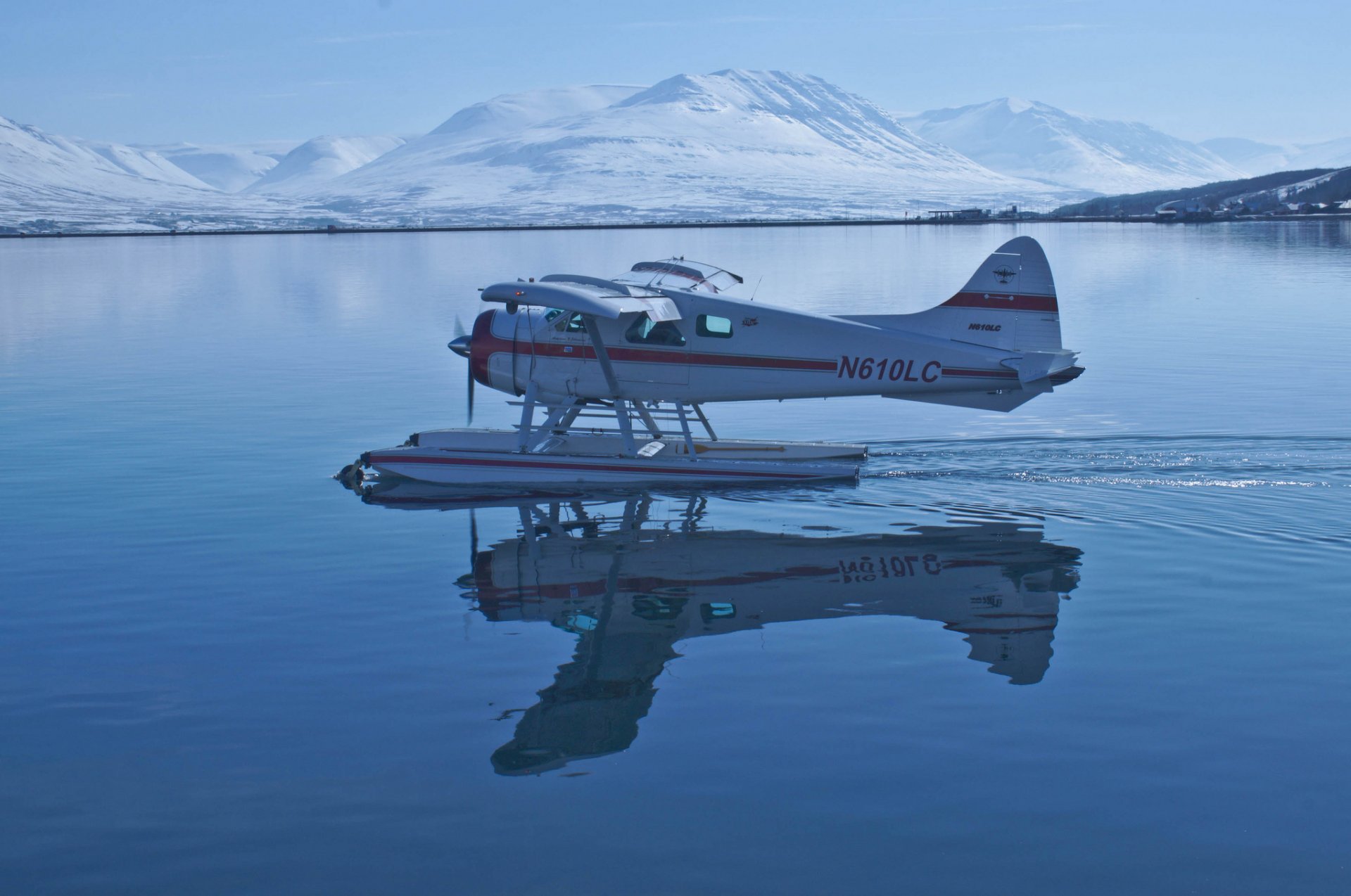 weden seaplane mountain water reflection