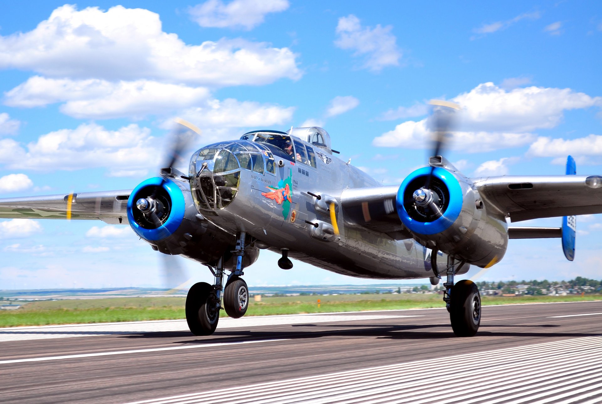 military historical club airplane north america b-25 mitchell north american b-25 mitchell american twin-engine all-metal bomber medium range action usa world war ii air show private collection retro