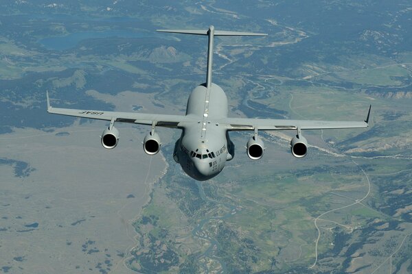 Boeing C-17 Globemaster III US military transport aircraft in flight