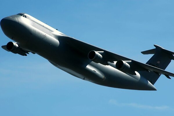 Military cargo plane, c-5, takes off