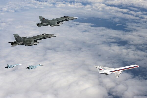 Escort of a passenger aircraft by fighters