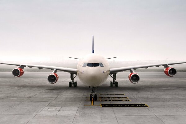 Photo of a white passenger airliner